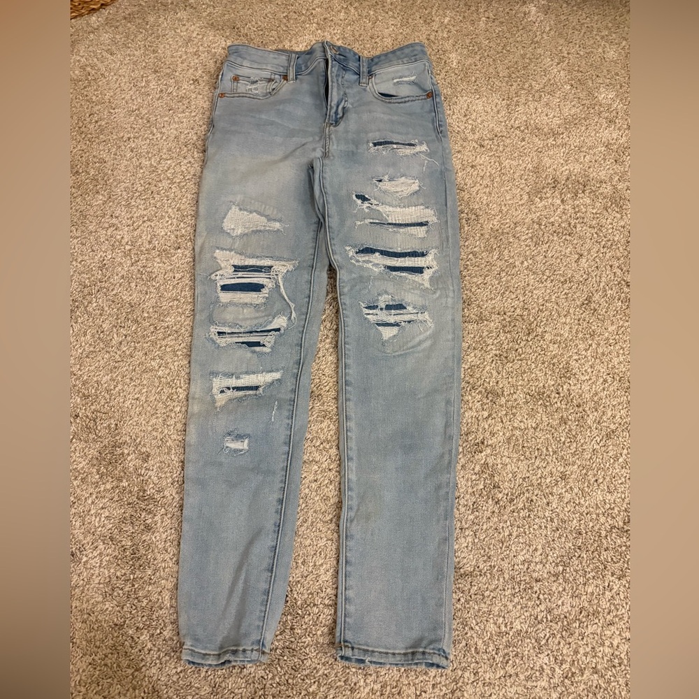 American Eagle Outfitters Light Blue Distressed Skinny Jeans. Next Level Stretch
